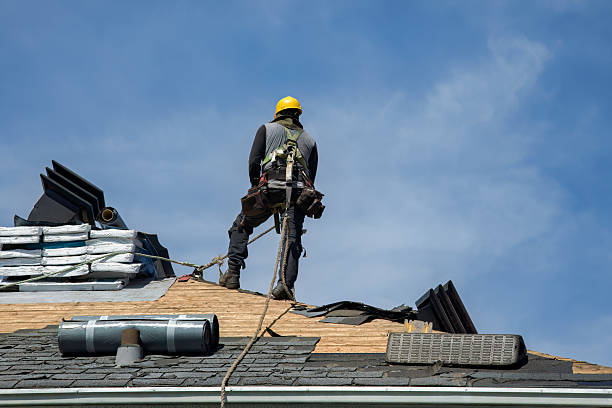 Professional Flat Roof Repair technician working in Donald, OR